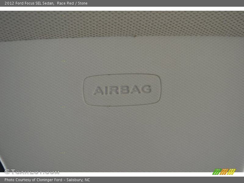 Race Red / Stone 2012 Ford Focus SEL Sedan