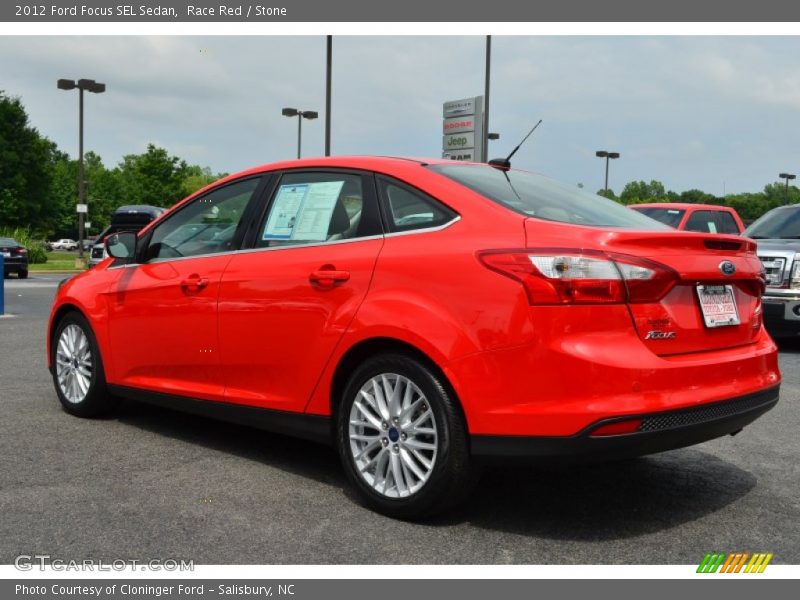 Race Red / Stone 2012 Ford Focus SEL Sedan