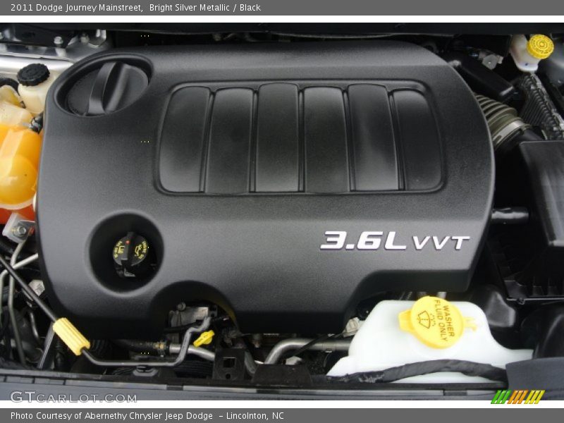 Bright Silver Metallic / Black 2011 Dodge Journey Mainstreet