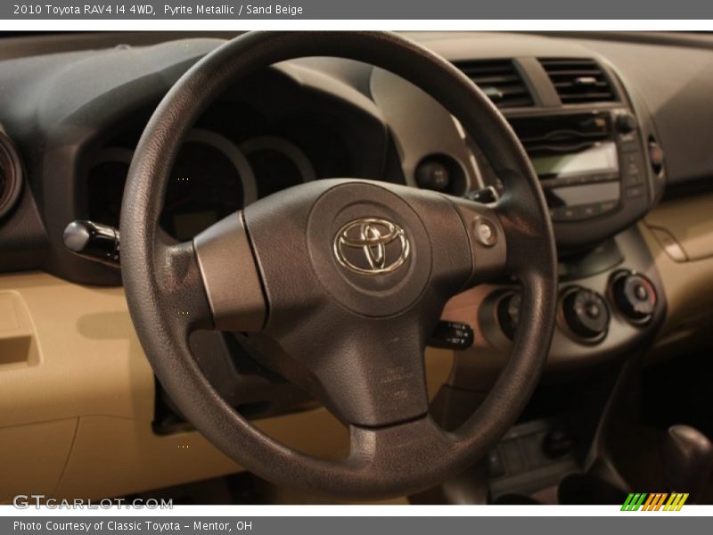 Pyrite Metallic / Sand Beige 2010 Toyota RAV4 I4 4WD