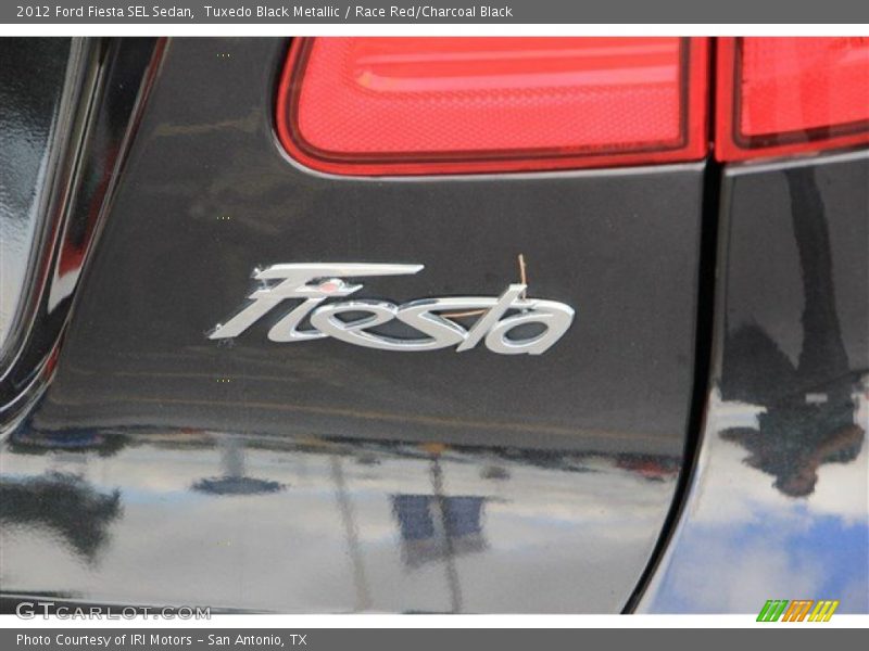 Tuxedo Black Metallic / Race Red/Charcoal Black 2012 Ford Fiesta SEL Sedan