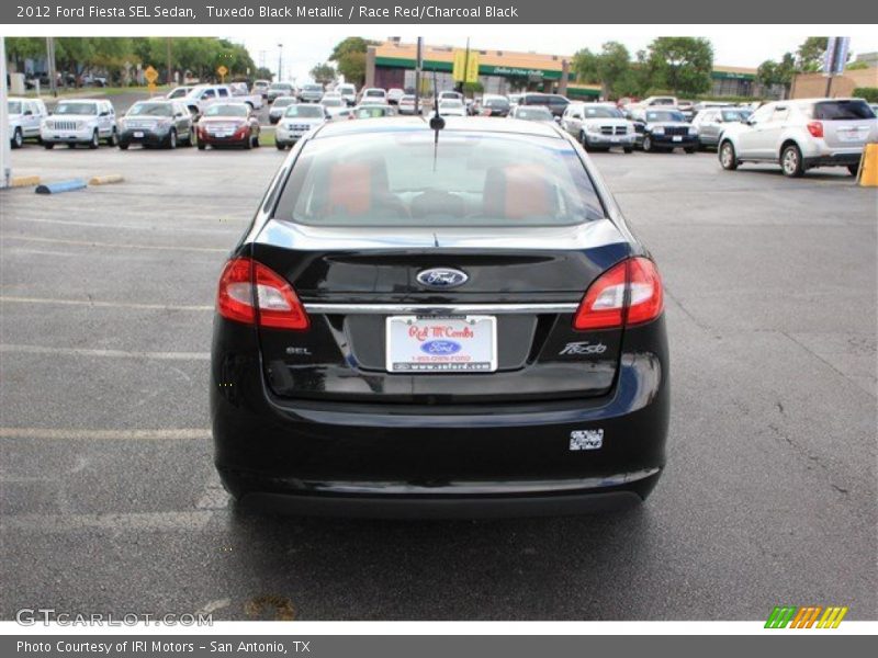 Tuxedo Black Metallic / Race Red/Charcoal Black 2012 Ford Fiesta SEL Sedan
