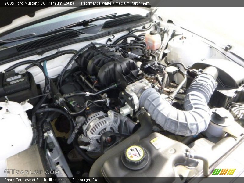Performance White / Medium Parchment 2009 Ford Mustang V6 Premium Coupe