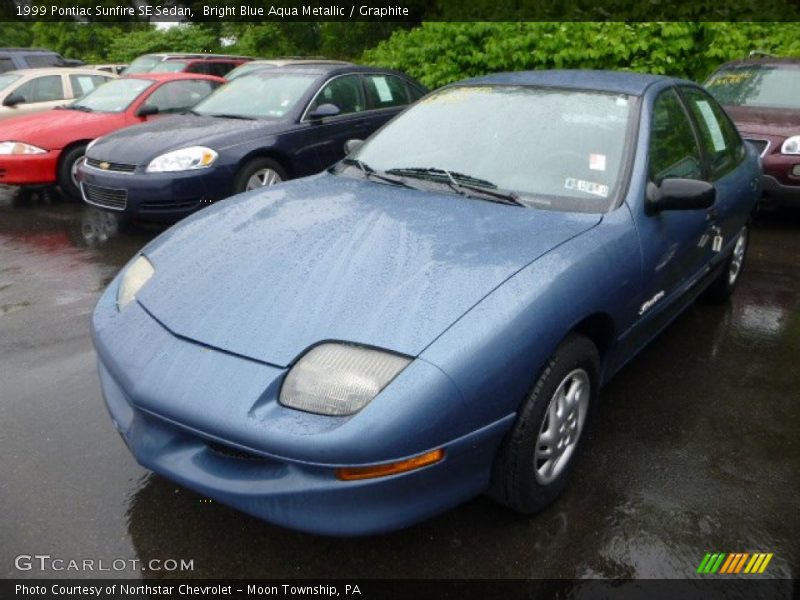 Bright Blue Aqua Metallic / Graphite 1999 Pontiac Sunfire SE Sedan