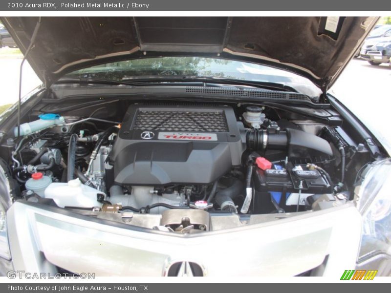 Polished Metal Metallic / Ebony 2010 Acura RDX