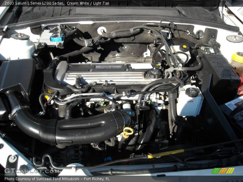 Cream White / Light Tan 2003 Saturn L Series L200 Sedan