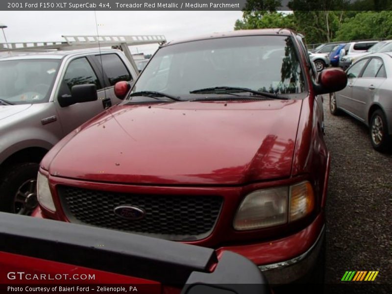 Toreador Red Metallic / Medium Parchment 2001 Ford F150 XLT SuperCab 4x4