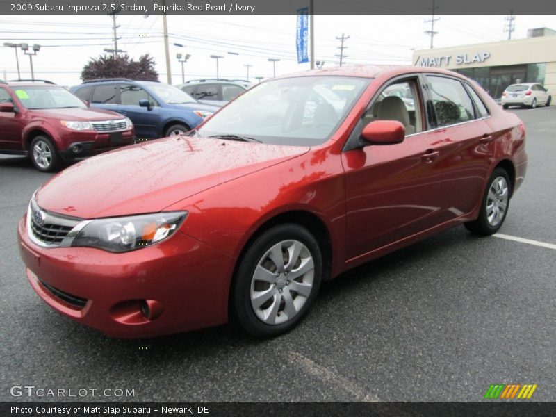 Paprika Red Pearl / Ivory 2009 Subaru Impreza 2.5i Sedan