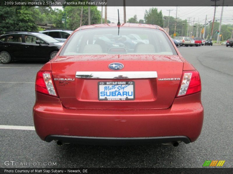 Paprika Red Pearl / Ivory 2009 Subaru Impreza 2.5i Sedan