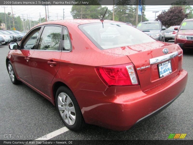Paprika Red Pearl / Ivory 2009 Subaru Impreza 2.5i Sedan