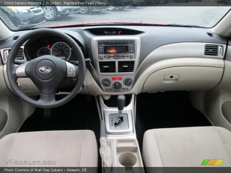 Paprika Red Pearl / Ivory 2009 Subaru Impreza 2.5i Sedan