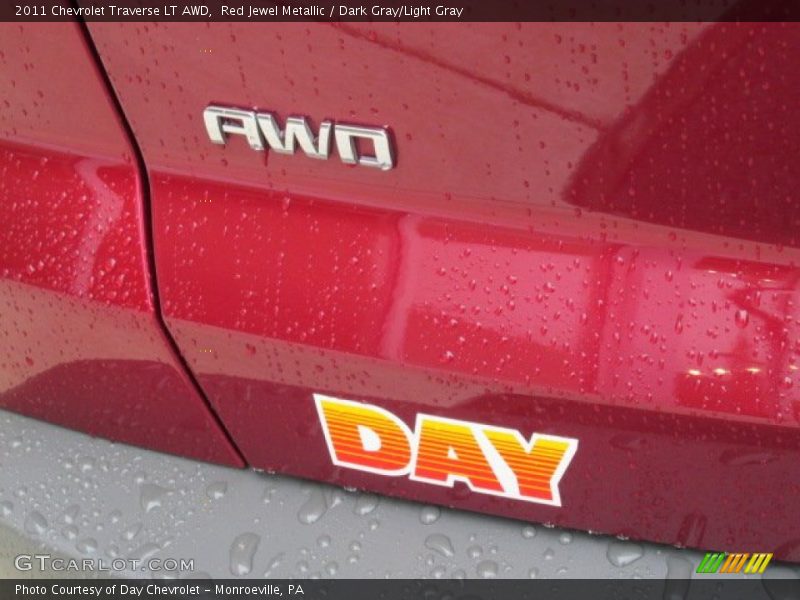 Red Jewel Metallic / Dark Gray/Light Gray 2011 Chevrolet Traverse LT AWD