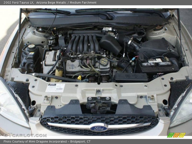 Arizona Beige Metallic / Medium Parchment 2002 Ford Taurus LX