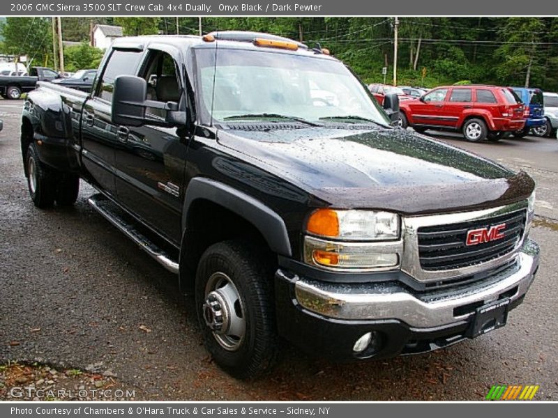 Front 3/4 View of 2006 Sierra 3500 SLT Crew Cab 4x4 Dually