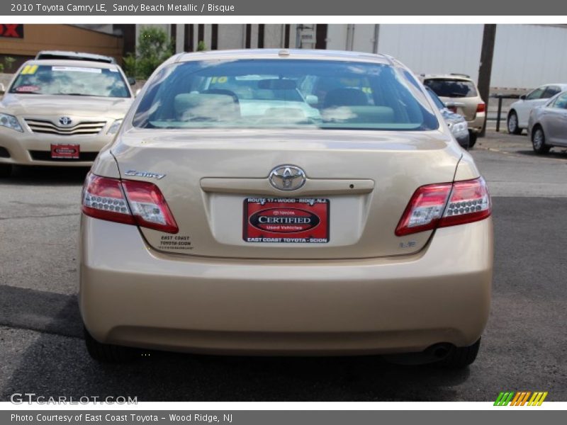 Sandy Beach Metallic / Bisque 2010 Toyota Camry LE