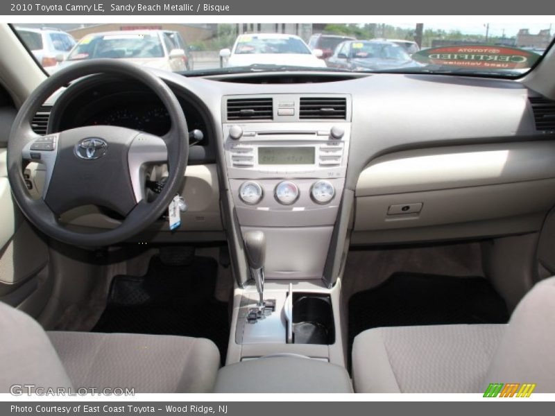 Sandy Beach Metallic / Bisque 2010 Toyota Camry LE