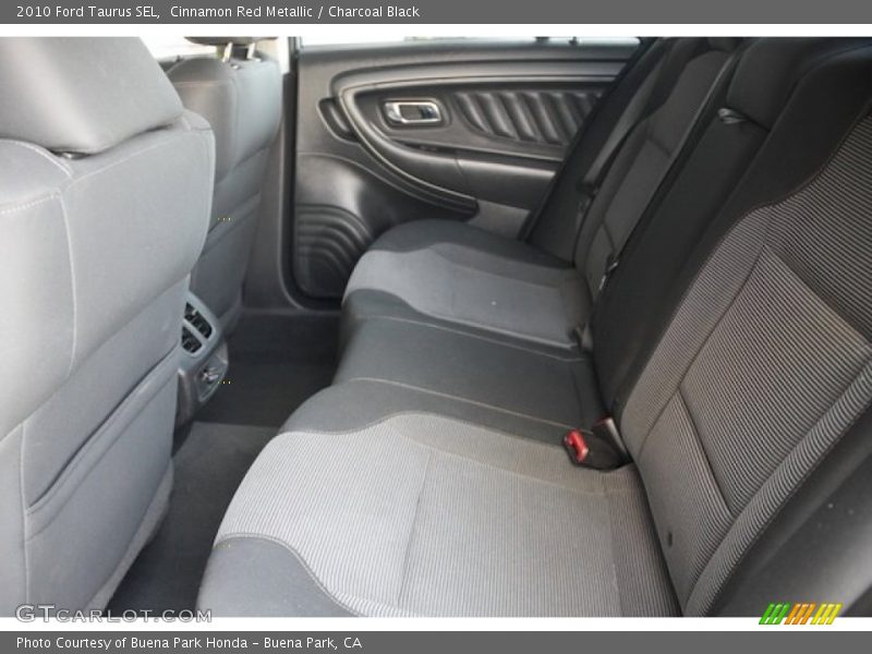 Cinnamon Red Metallic / Charcoal Black 2010 Ford Taurus SEL