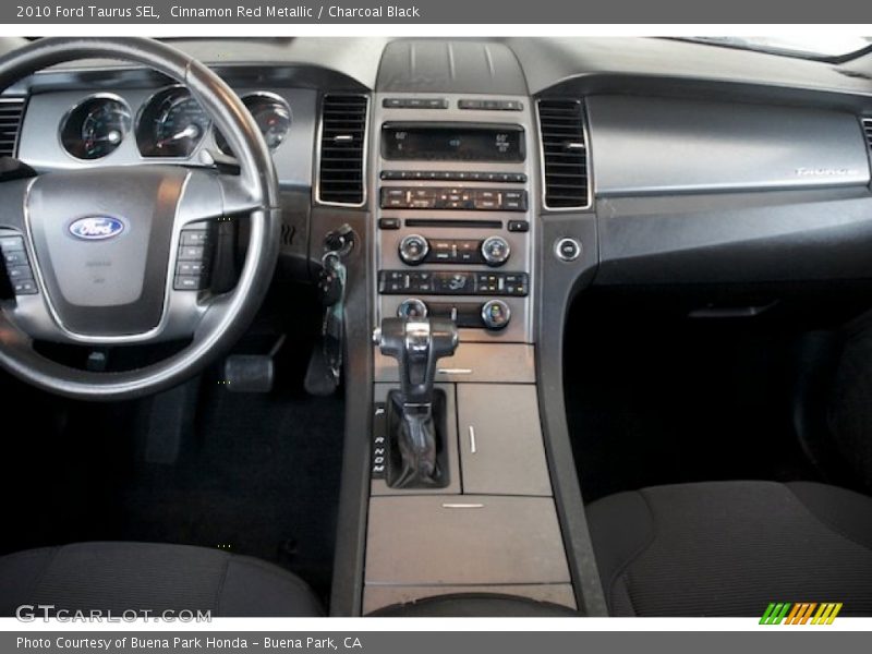 Cinnamon Red Metallic / Charcoal Black 2010 Ford Taurus SEL