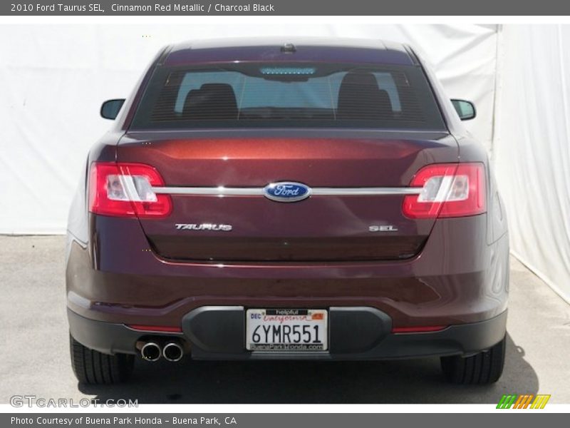 Cinnamon Red Metallic / Charcoal Black 2010 Ford Taurus SEL