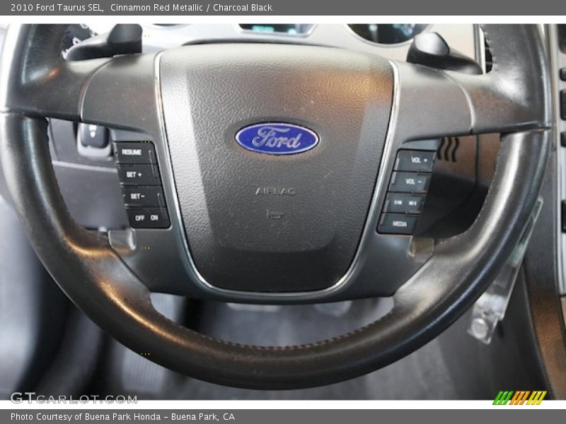 Cinnamon Red Metallic / Charcoal Black 2010 Ford Taurus SEL