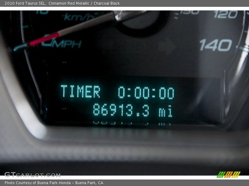 Cinnamon Red Metallic / Charcoal Black 2010 Ford Taurus SEL