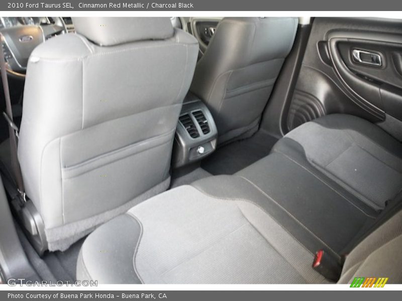 Cinnamon Red Metallic / Charcoal Black 2010 Ford Taurus SEL