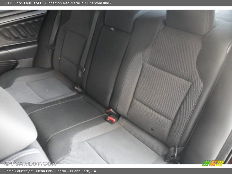 Cinnamon Red Metallic / Charcoal Black 2010 Ford Taurus SEL