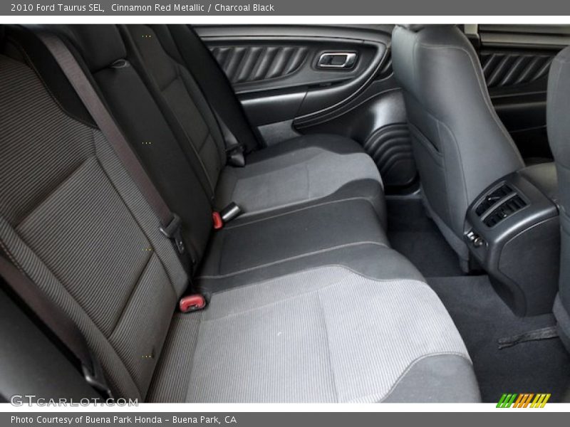 Cinnamon Red Metallic / Charcoal Black 2010 Ford Taurus SEL