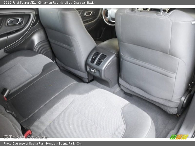 Cinnamon Red Metallic / Charcoal Black 2010 Ford Taurus SEL