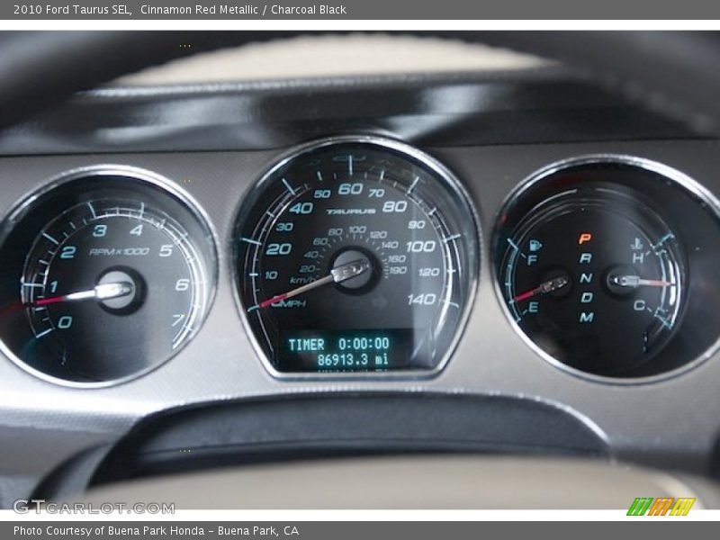Cinnamon Red Metallic / Charcoal Black 2010 Ford Taurus SEL