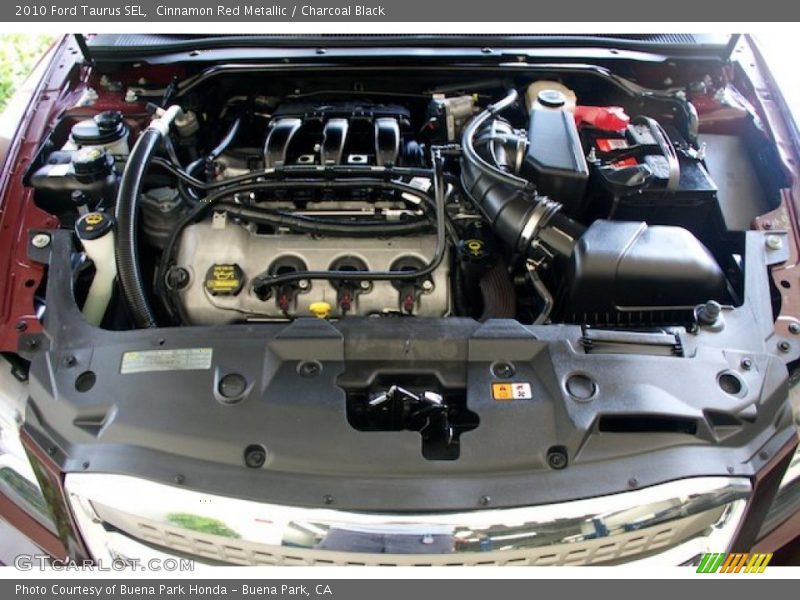 Cinnamon Red Metallic / Charcoal Black 2010 Ford Taurus SEL