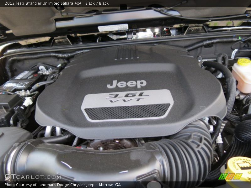 Black / Black 2013 Jeep Wrangler Unlimited Sahara 4x4