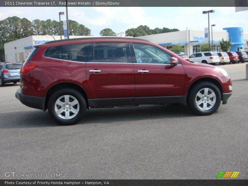 Red Jewel Metallic / Ebony/Ebony 2011 Chevrolet Traverse LT