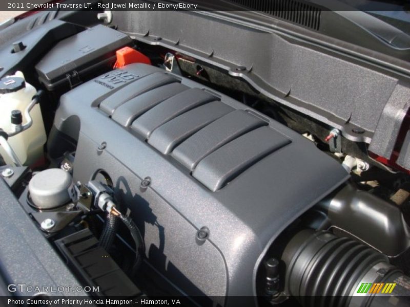 Red Jewel Metallic / Ebony/Ebony 2011 Chevrolet Traverse LT
