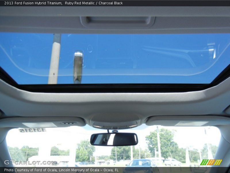 Ruby Red Metallic / Charcoal Black 2013 Ford Fusion Hybrid Titanium