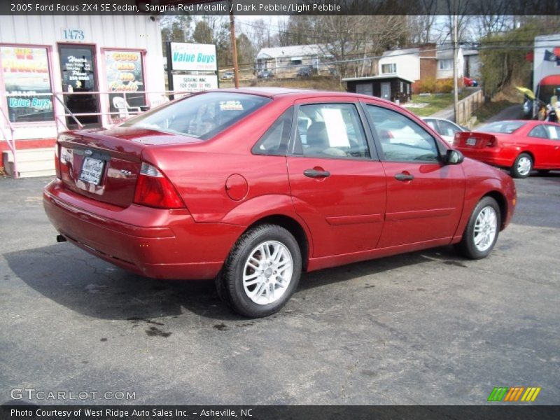 Sangria Red Metallic / Dark Pebble/Light Pebble 2005 Ford Focus ZX4 SE Sedan