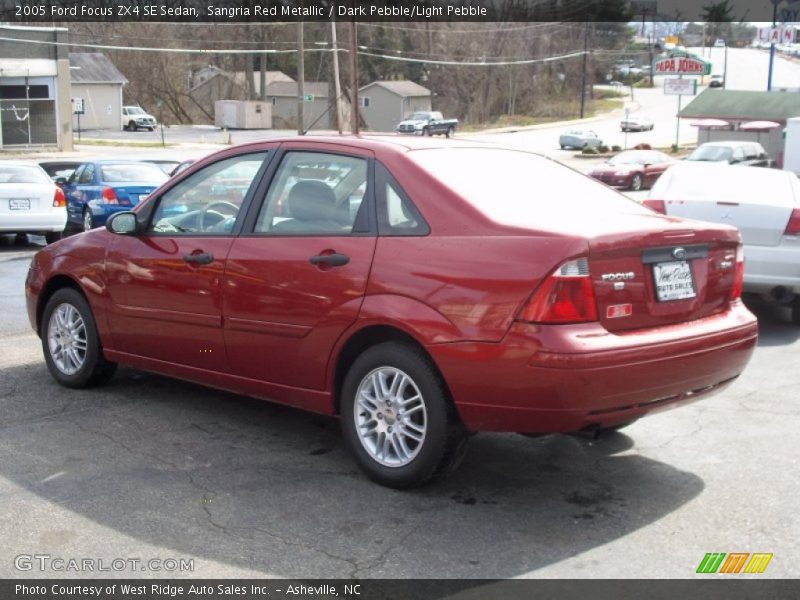 Sangria Red Metallic / Dark Pebble/Light Pebble 2005 Ford Focus ZX4 SE Sedan