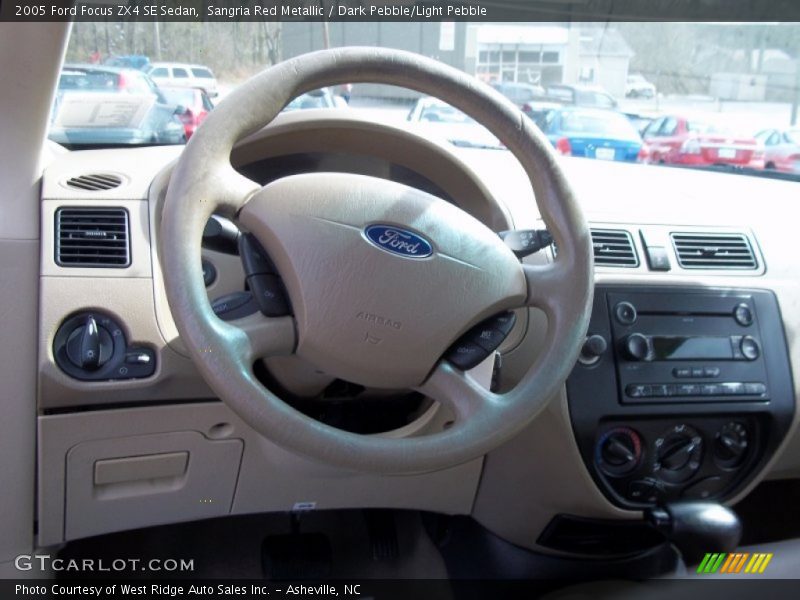 Sangria Red Metallic / Dark Pebble/Light Pebble 2005 Ford Focus ZX4 SE Sedan