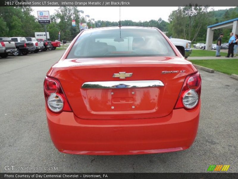 Inferno Orange Metallic / Jet Black/Brick 2012 Chevrolet Sonic LT Sedan