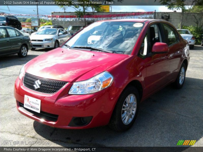 Crimson Red Metallic / Black 2012 Suzuki SX4 Sedan LE Popular Package