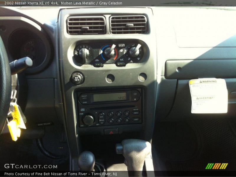 Molten Lava Metallic / Gray Celadon 2002 Nissan Xterra XE V6 4x4