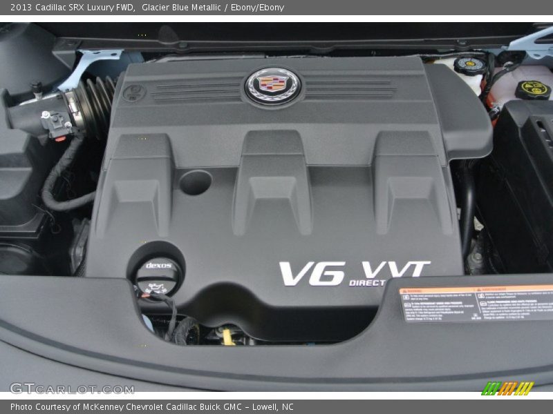Glacier Blue Metallic / Ebony/Ebony 2013 Cadillac SRX Luxury FWD
