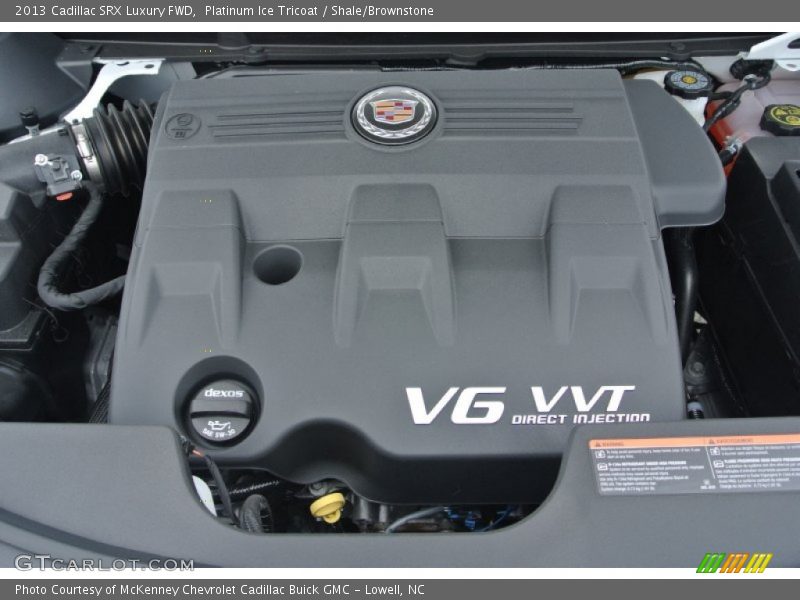 Platinum Ice Tricoat / Shale/Brownstone 2013 Cadillac SRX Luxury FWD