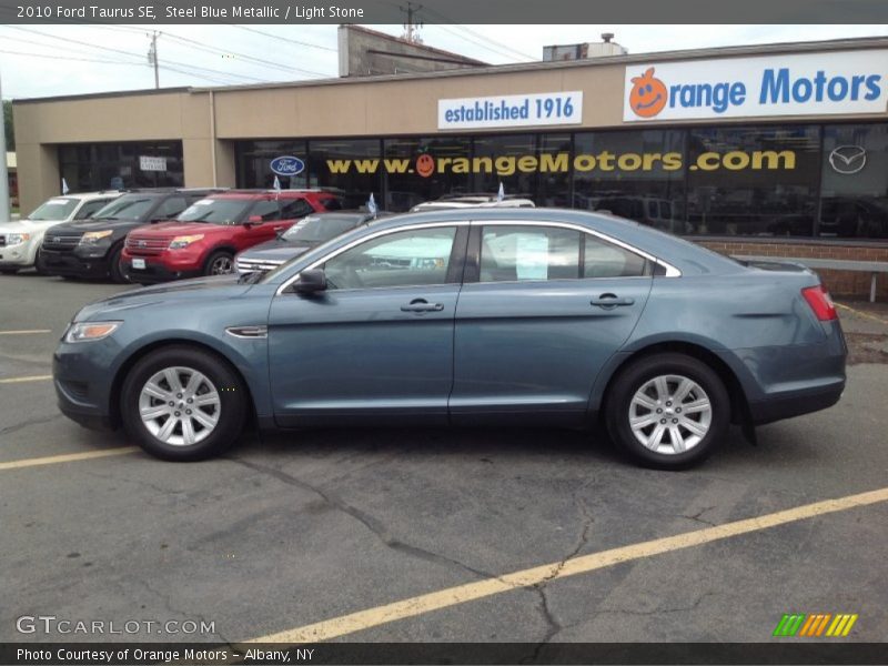Steel Blue Metallic / Light Stone 2010 Ford Taurus SE
