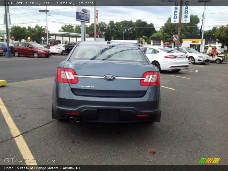 Steel Blue Metallic / Light Stone 2010 Ford Taurus SE
