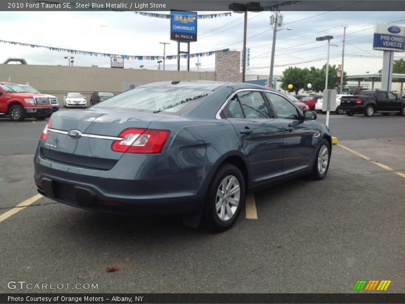 Steel Blue Metallic / Light Stone 2010 Ford Taurus SE