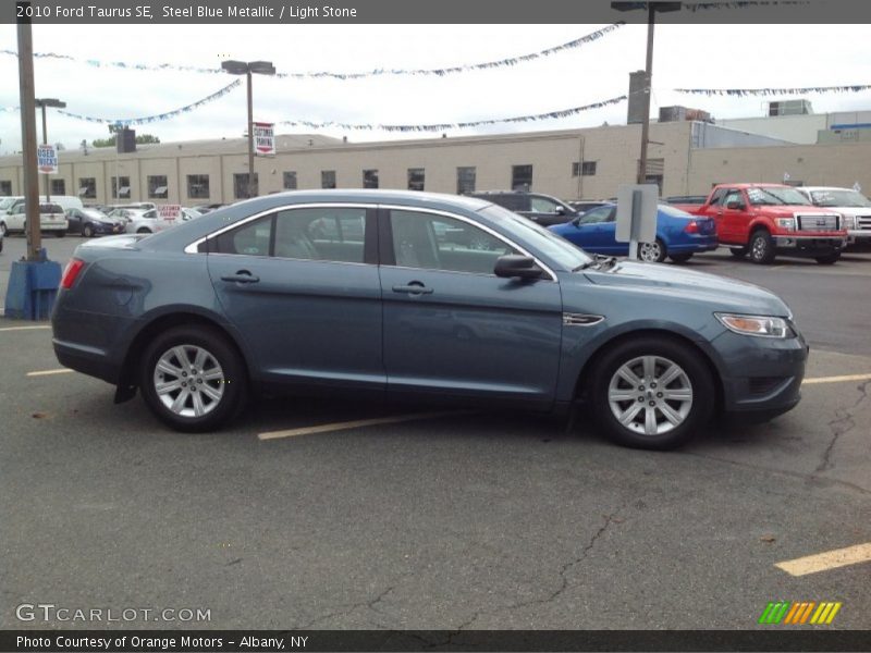Steel Blue Metallic / Light Stone 2010 Ford Taurus SE