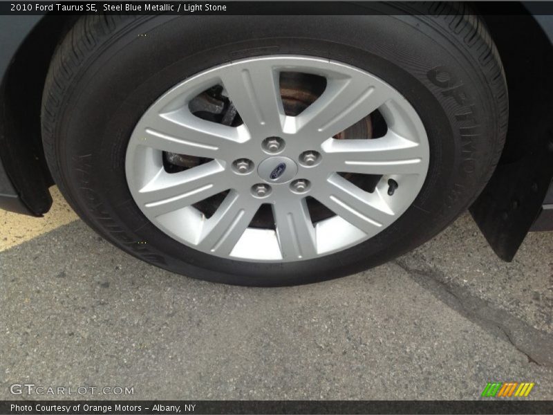 Steel Blue Metallic / Light Stone 2010 Ford Taurus SE