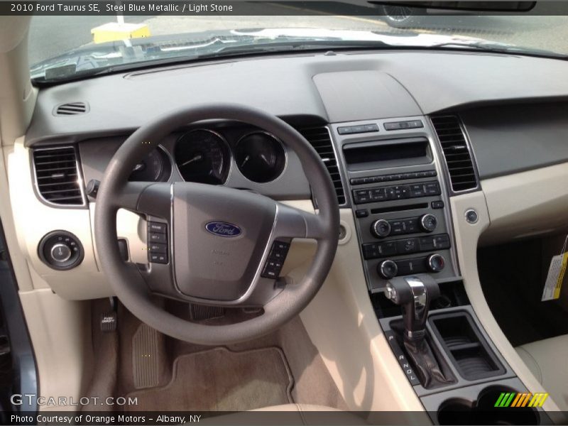 Steel Blue Metallic / Light Stone 2010 Ford Taurus SE