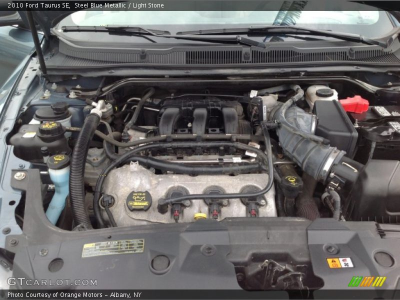 Steel Blue Metallic / Light Stone 2010 Ford Taurus SE